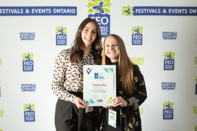 Natalie Hagopian and Jessica Vergis-Mayo holding Caledon's FEO Top 100 Award