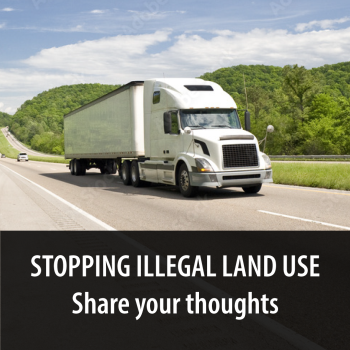 photo of tractor trailer with text that says stopping illegal land use