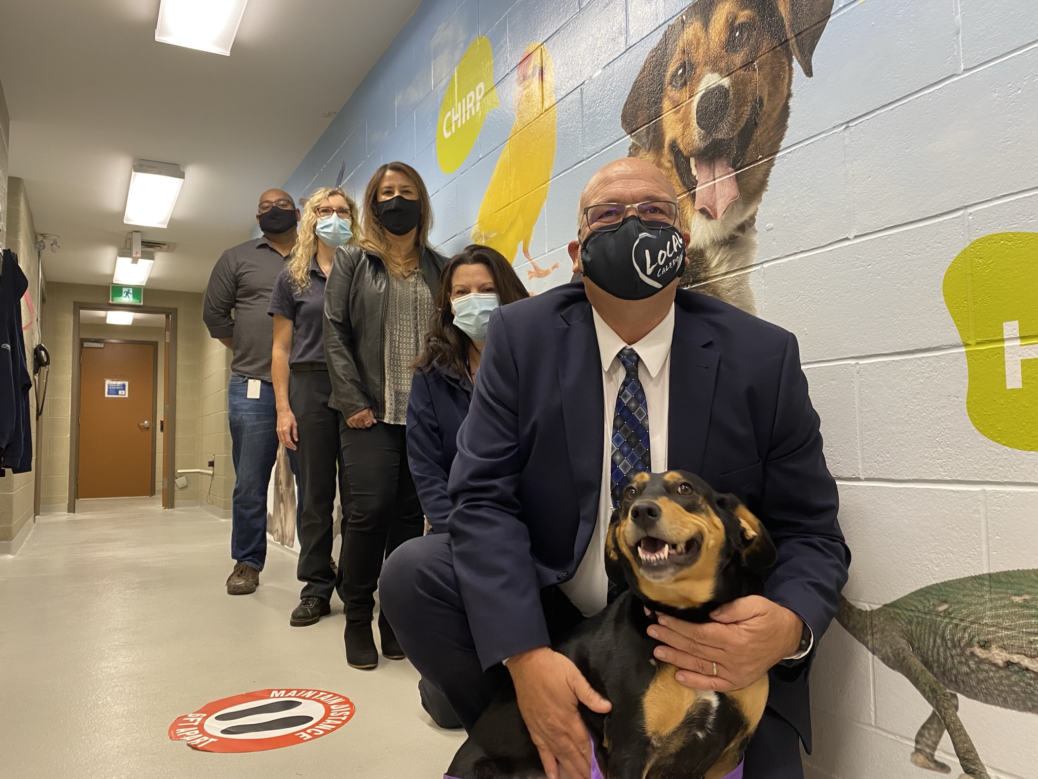 dog, Mayor and Town staff at the Animal Shelter