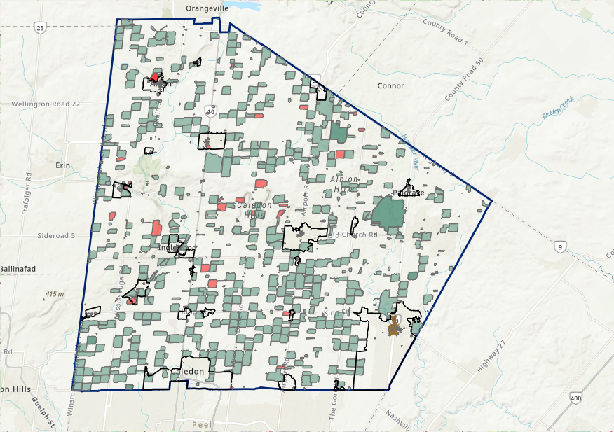 Room full of people watching a presentation